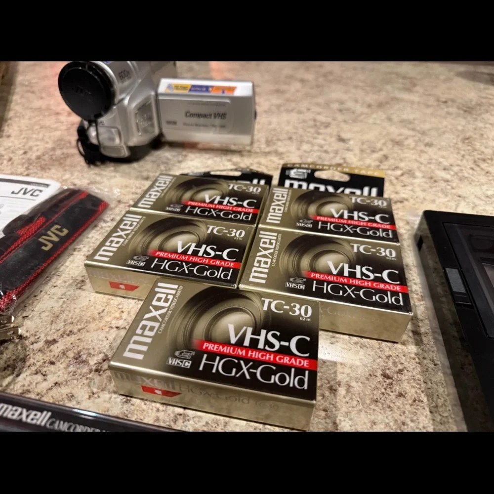 JVC Gray Camcorder with VHS-C Tapes
